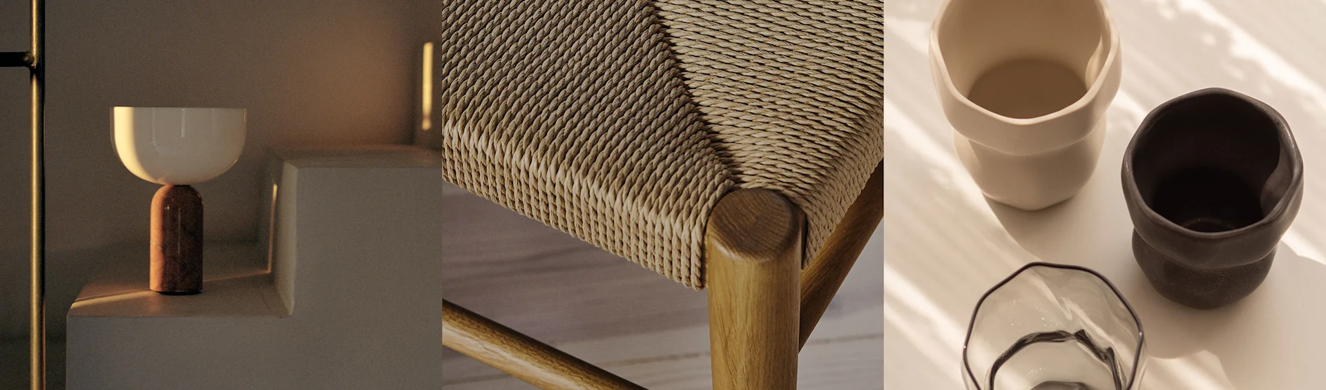 En modern lampa, en flätad stolssits och två keramikmuggar med en glasskål, allt i varma toner.